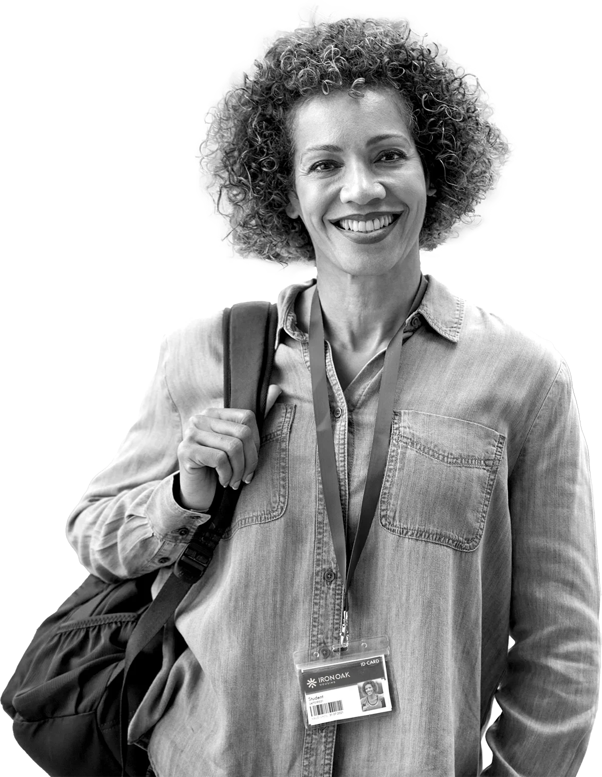 Smiling person with badge and backpack